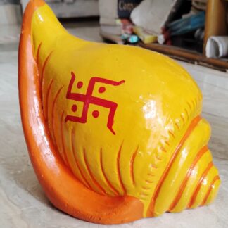 Beautiful clay gullak for home or puja room decor.