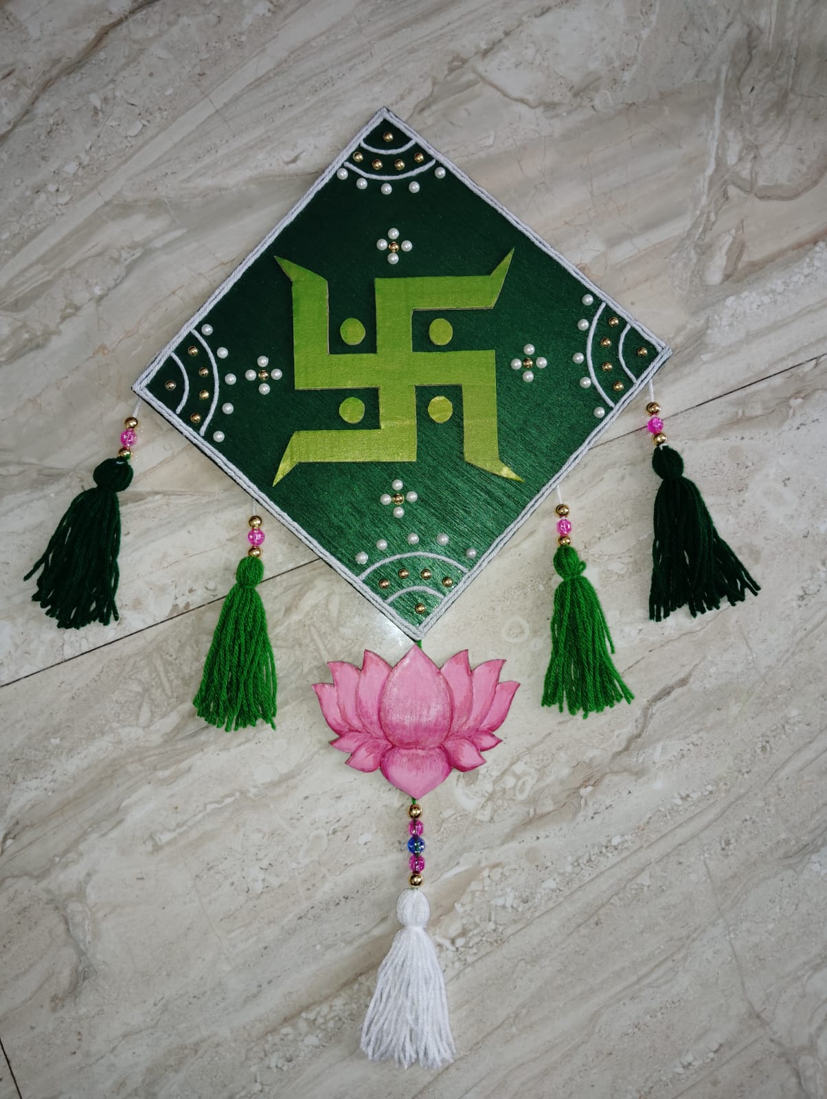 Swastik sign with lotus decoration