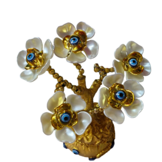 Premium white flower decorative showpiece with gold finish and evil eye accents. Elegant table décor for home, office, gifting & festive decoration.